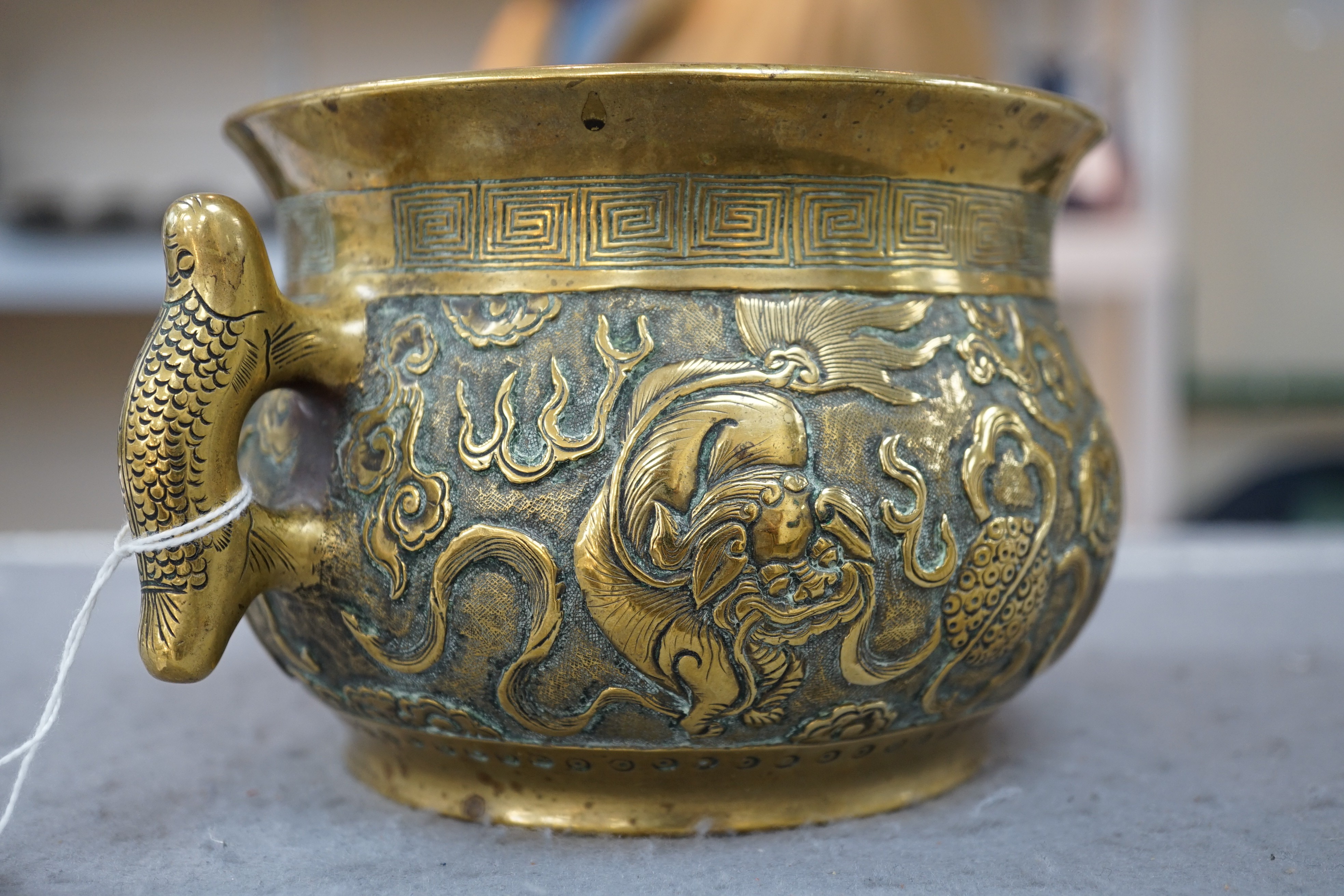 A Chinese polished bronze ‘Buddhist lion’ censer, gui, 19th century, 19.5cm wide, rim diameter 14cm